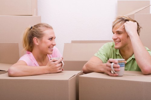 Moving boxes and furniture prepared for transport in Southfields