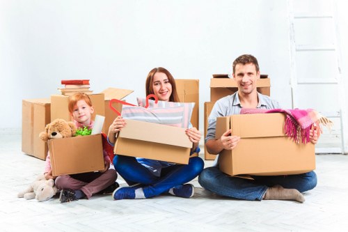 Local team collecting sofas and beds from a Southfields property