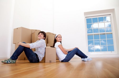 Warehouse worker and moving van symbolising ethical transport operations