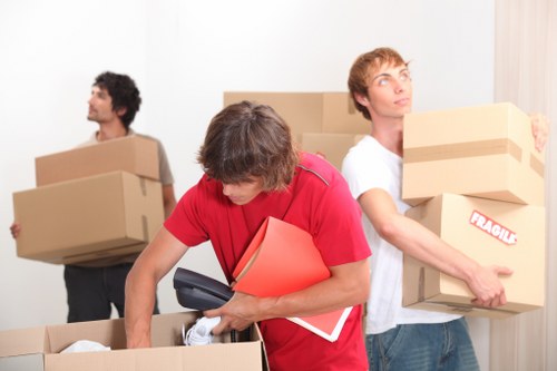 Local moving team preparing items for transport in Southfields