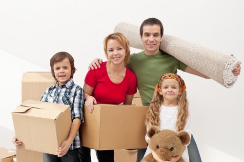 Professional loading of boxes and furniture into a moving truck in Southfields