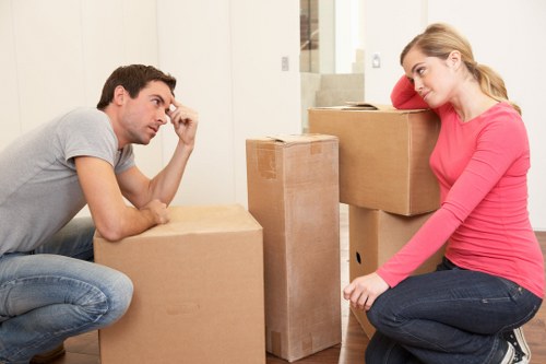 Packed boxes and furniture ready for a house removal in Southfields