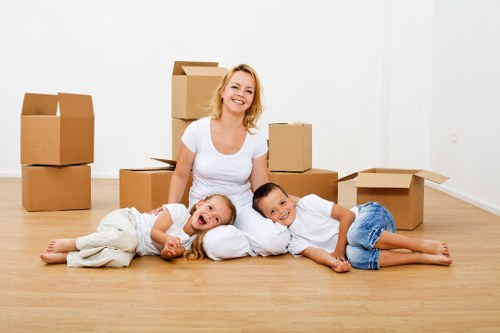 Packed boxes and furniture loaded into a moving van