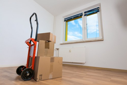 Packed boxes and moving supplies ready for a Southfields relocation