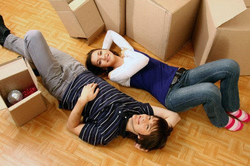 Staff handling furniture carefully during a removals service