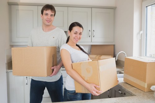 Movers handling a flat relocation near Southfields Station